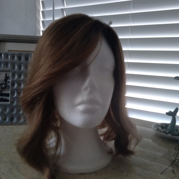 Uniwigs human hair topper. Silk top.